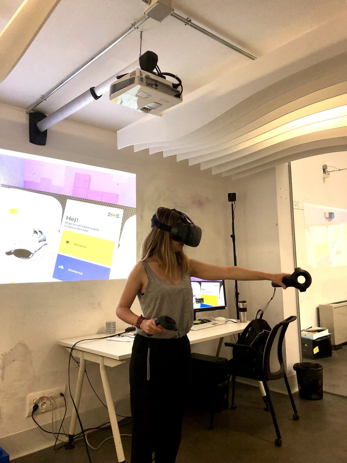 A user wearing a VR headset, testing the IKEA spatial shopping concept